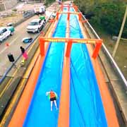 slide the city bringing giant slip and slide